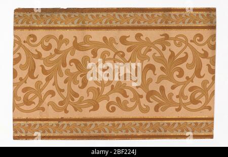 Frieze. Flitter frieze with wide central band of foliate rinceau. Along both top and bottom edges run narrow bands of meandering foliate vines against blue background. Printed in shades of tan, brown, blue and mica flakes on ungrounded salmon-color ingrain paper. Stock Photo