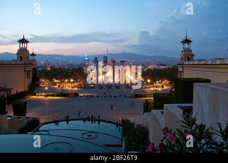 Glow Towers Magic Fountain Fountains Barcelona City Skyline Dusk Sunset Lights The Four Columns Montjuic, Barcelona, Spain Stock Photo