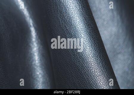 Black leather close up. rough material abstract background Stock Photo