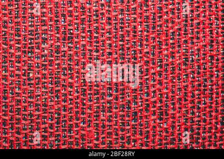 Red fabric texture macro. textile background extremely close up. woven pattern Stock Photo