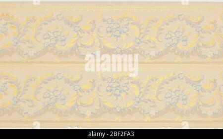 Frieze. Two borders printed across the width. Foliate rinceau printed in metallic gold, light blue, and white on tan ground. Stock Photo
