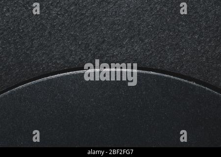 Black background with a curved slit. plastic texture macro Stock Photo