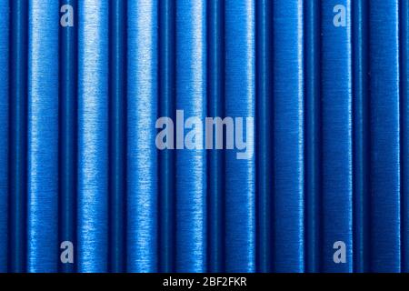Blue striped surface with parallel lines. plastic background. colored metal plate texture Stock Photo