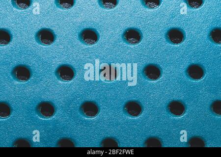 Holes in plastic surface. abstract pattern background Stock Photo