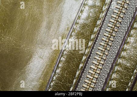 Leather background with zipper closure. material with seams close up Stock Photo