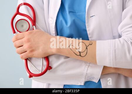 Stethoscope tattoo by tattooist Cholo  Tattoogridnet