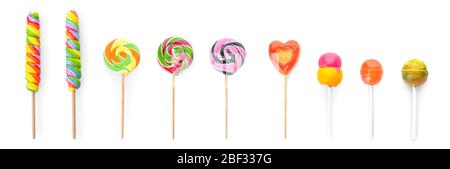 Different sweet lollipops on white background Stock Photo