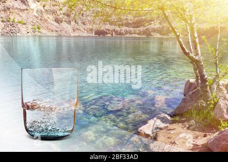 Double exposure of nature and glass of pure water Stock Photo