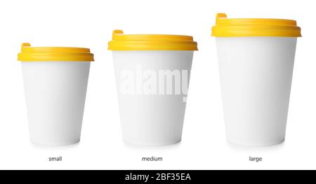 Different sized takeaway coffee cups on white background Stock Photo