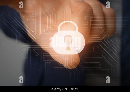 Businessman using fingerprint protection for data access, closeup Stock Photo