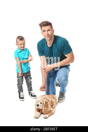 Young man and his little son suffering from pet allergy on white background