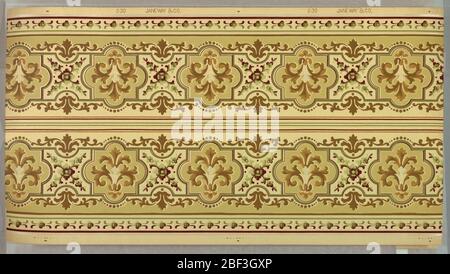Frieze. Borders printed two across. Wide central band of interlocking geometric shapes (puzzle-like), each containing stylized foliate motif, bordered by dot and floral motifs. Top has white mica beading, dark red stripe, green tan stripe. Stock Photo