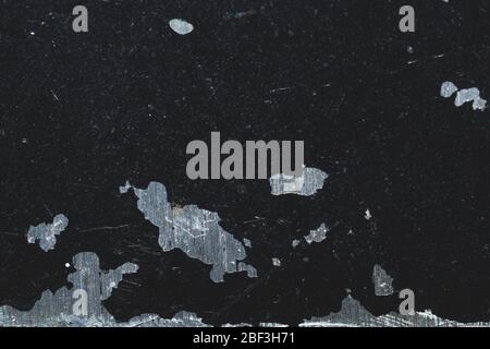 Black iron plate background. grunge texture. rough steel close up. metal surface macro Stock Photo