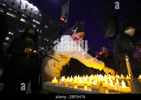 New York, United States. 16th Apr, 2020. Candlelight vigil at the Elmhurst Hospital Center in Queens, New York, during a COVID-19 coronavirus pandemic in the United States. Credit: Brazil Photo Press/Alamy Live News Stock Photo