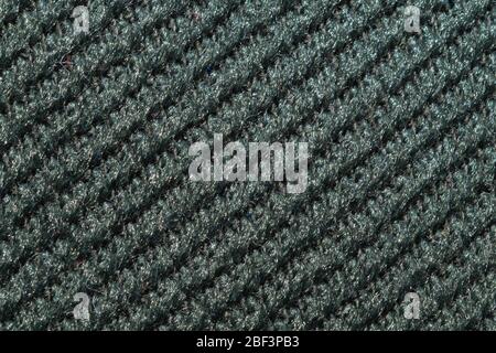 Black fabric texture. knitted textile background. woven material close up. knitting from wool yarn Stock Photo