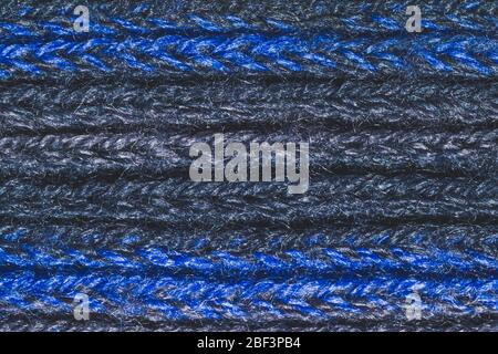 Blue fabric texture. knitted textile background. woven material close up. knitting from wool yarn Stock Photo
