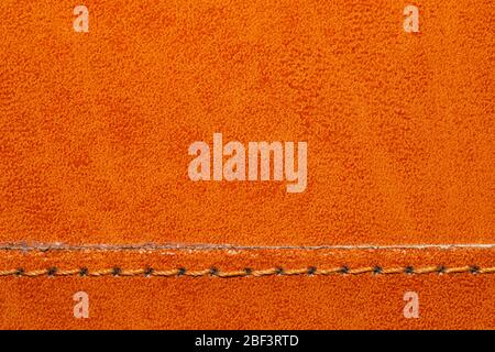 Brown leather texture with a linear stitch. material with seam Stock Photo