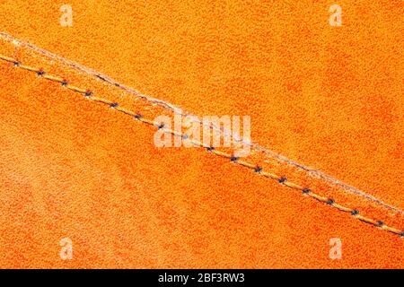 Brown leather texture with a linear stitch. material with seam Stock Photo