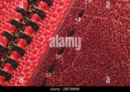 Red leather texture with zipper closure. material with seams macro background Stock Photo