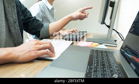 Team of programmers working together development Website design and coding technologies in a software develop company office, Coworkers Team concept Stock Photo