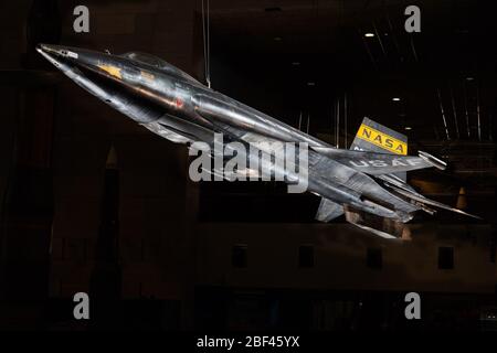 North American X15. North American X-15, rocket powered experimental aircraft; black titanium skin with wedge shaped horizontal stablizer; yellow stripe NASA inisignia on tail with stars and red bars United States national insignia on wings; white letter text 'U.S. Stock Photo