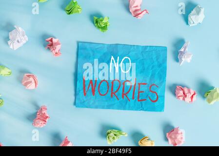 Writing note showing No Worries. Business concept for an expression used to say that everything is all right Colored crumpled rectangle shaped reminde Stock Photo