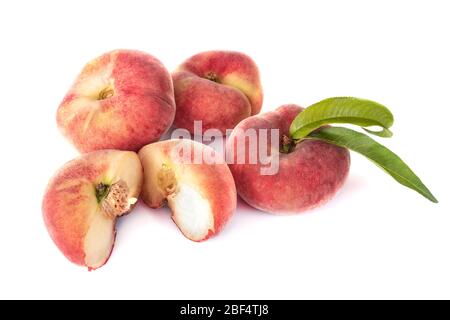 Saturn peaches in front of white background Stock Photo