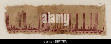 Fragment of a garment with embroidered inscription. Natural linen ground with Arabic inscription embroidered in red silk. Translation: 'In the name of God, the Merciful, the Compassionate. Praise be to God, Lord of the Worlds. Stock Photo