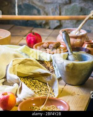 traditional country cuisine and medieval medicine, ingredients, agricultural and hunting products, millet, lentils, rice, hazelnuts, spelled, ginger, Stock Photo