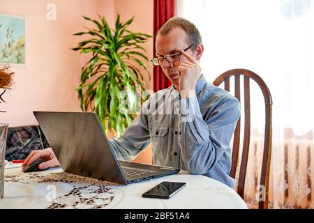 Man is learning new thing at home. Stock Photo