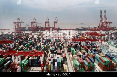 Beijing, Yangshan Port in Shanghai. 17th Apr, 2020. Photo taken on May 17, 2018 shows a container dock of Yangshan Port in Shanghai, east China. TO GO WITH XINHUA HEADLINES OF APRIL 17, 2020. Credit: Fang Zhe/Xinhua/Alamy Live News Stock Photo