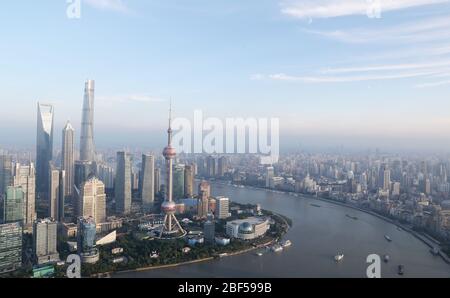 Beijing, Lujiazui area in Shanghai. 17th Apr, 2020. Photo taken on June 21, 2018 shows a view of the Lujiazui area in Shanghai, east China. TO GO WITH XINHUA HEADLINES OF APRIL 17, 2020. Credit: Fang Zhe/Xinhua/Alamy Live News Stock Photo