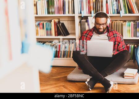 African-American student preparing for exam in library Stock Photo