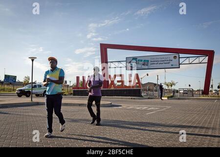 Johannesburg, South Africa. 16th Apr, 2020. Pedestrians are seen on the street in Johannesburg, South Africa, April 16, 2020. South Africa's COVID-19 deaths jumped by 14 in 24 hours as the novel coronavirus sickened 99 more people, Health Minister Zweli Mkhize said on Thursday. The total number of COVID-19 cases in the country has reached 2,605, the minister said. Credit: Yeshiel/Xinhua/Alamy Live News Stock Photo