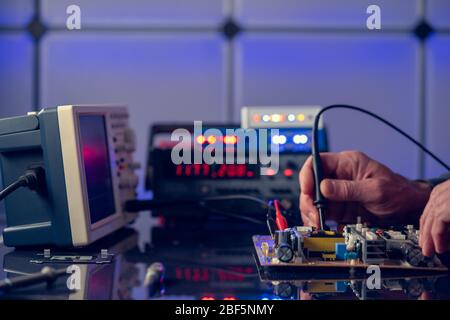 PCB witch microcontroller in electronics laboratory Stock Photo