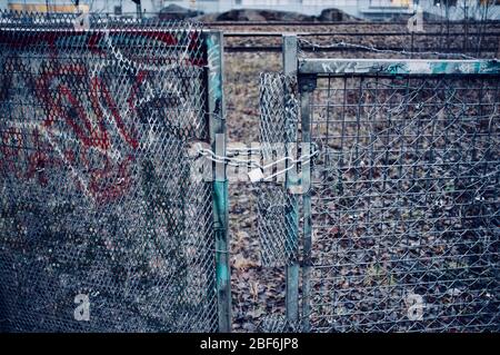 A locked gate at the railyard in Stockholm, Sweden Stock Photo