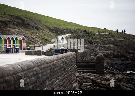 Barry Island, Vale of Glamorgan, Wales, UK. 13th April 2020. Locals at Barry Island in south Wales help reduce the spread of COVID-19 by utilising soc Stock Photo