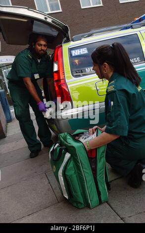 Emergency medical technicians check medical supplies. Stock Photo