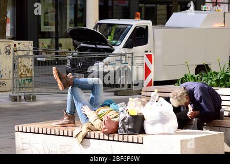 Vienna, Austria. 17th Apr, 2020. The exit restrictions in Austria have been extended to end of April  2020. A homeless woman enjoys the warm spring weather. Credit: Franz Perc / Alamy Live News Stock Photo