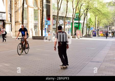 Vienna, Austria. 17th Apr, 2020. The exit restrictions in Austria have been extended to end of April  2020. Few people move in the large shopping street 'Mariahilferstrasse', despite some business openings. Credit: Franz Perc / Alamy Live News Stock Photo