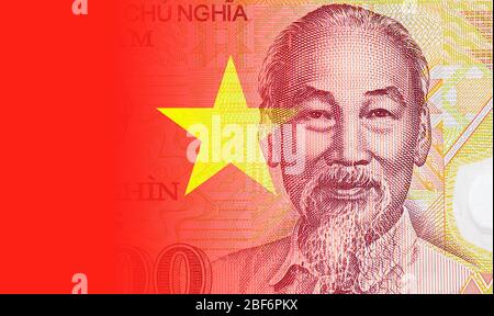 Close-up portrait of Ho Chi Minh and national red flag on the Vietnamese Banknote, Vietnam paper money Stock Photo