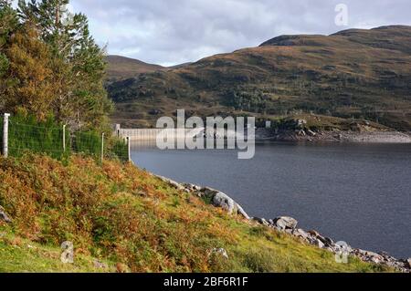 Mullardoch Dam, Glenn Cannich, Beauly, Inverness-Shire, Scotland, UK 24/09/19. A September view of the West facing elevation of the Mullardoch Dam Stock Photo