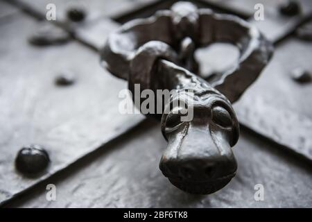 medieval doorbell in a shape of snake. Prague Stock Photo