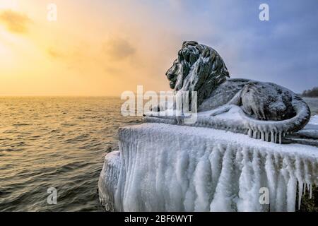 Ice-covered Bavarian Lions on a frosty winter day in Tutzing on Lake Starnberg, Germany, Bavaria, Oberbayern, Upper Bavaria, Tutzing Stock Photo