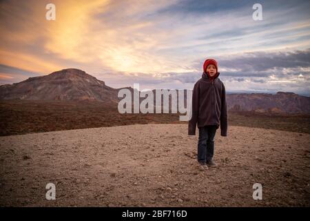 Boy  on an expedition. Mountains on Tenerife,  National Park Vulcan El Teide, Canary Island, Stock Photo