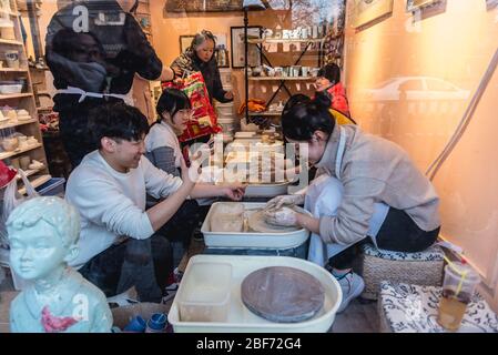 Pottery lesson at Gulou East Street in Beijing, China Stock Photo
