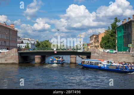 St. Petersburg, Russia, summer 2019: Adjacent bridge at the junction of the Fontanka River and the Kryukov Canal in St. Petersburg Stock Photo