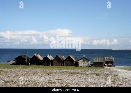 A row of small boat houses, found on Fårö, Gotland, Sweden. Stock Photo