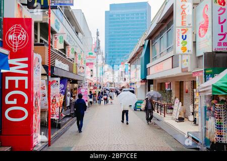 Tokyo, Japan - Febuary 23, 2017: Crowded people in the beautiful and famous Shinjuku neighborhood. More than three hundred thousand people live in Stock Photo