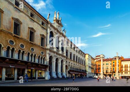 Vicenza / Italy - October, 01, 2017: Church of St. Vincent and columns with sculptures of piazza dei Signori. Stock Photo